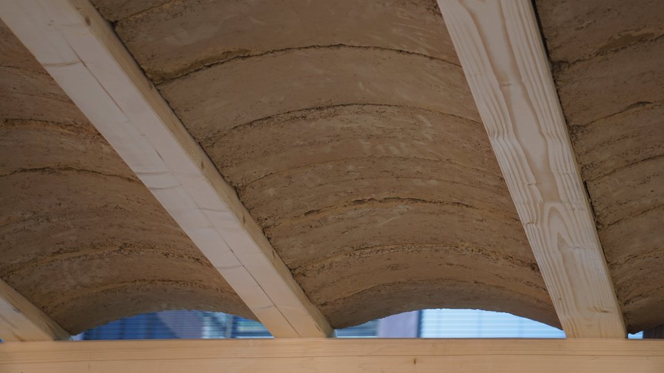 zu sehen ist eine gewölbten Decke aus Lehmziegeln zwischen Holzbalken