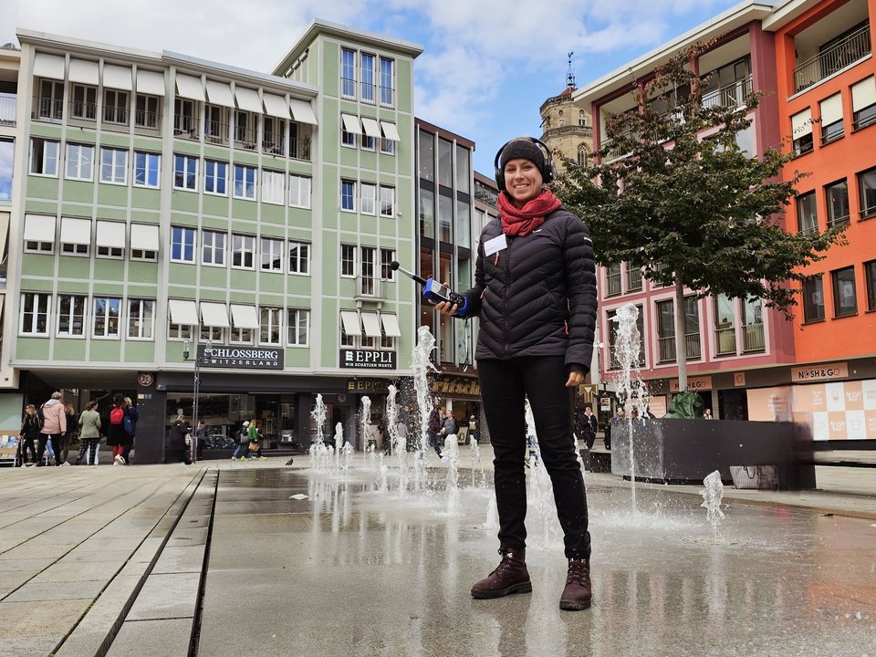 Promovierende bei Hörversuchen in der Stadt