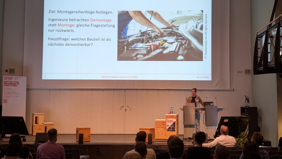 Tag der Forschung 2026 - Keynote "Digitale Montageplanung im Automobilbau", Prof. Dr. Nicola Wolpert und Kai Schleicher, Doktorand, HFT Stuttgart
