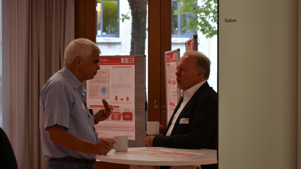 Prof. Dr. Alexander Rausch und Prof. Dr. Dieter Uckelmann im Gespräch