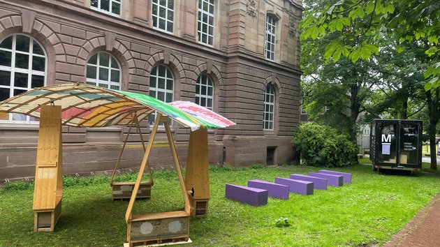 Ein Holzmodell in Stadtgarten